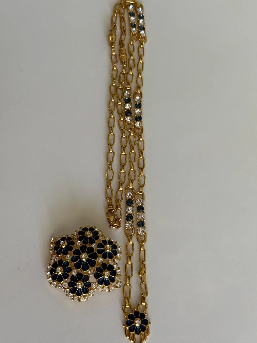 Camrose & Kross elegant gold